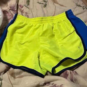 Bright yellow and blue running shorts
